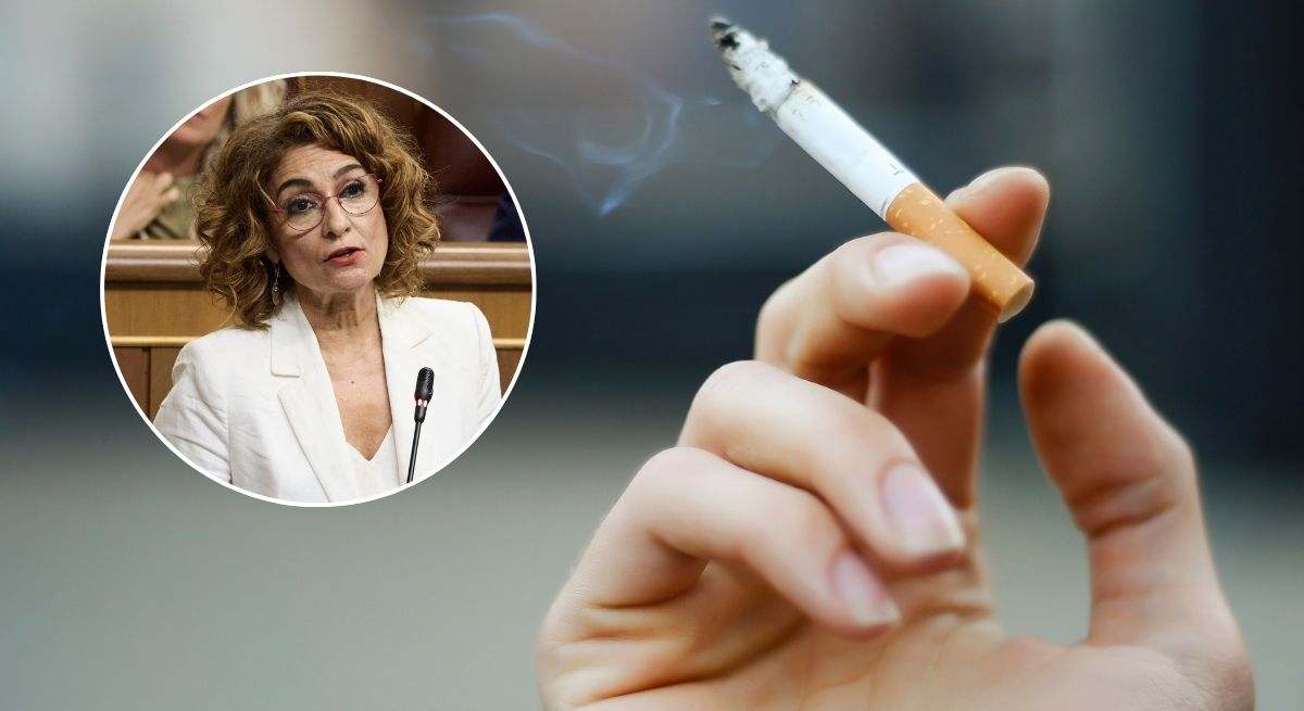 Una persona sosteniendo un cigarro