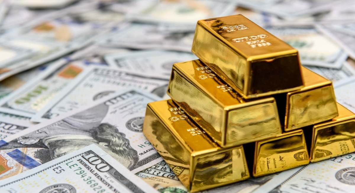 lingotes-oro-billetes-dolar-istock.jpg