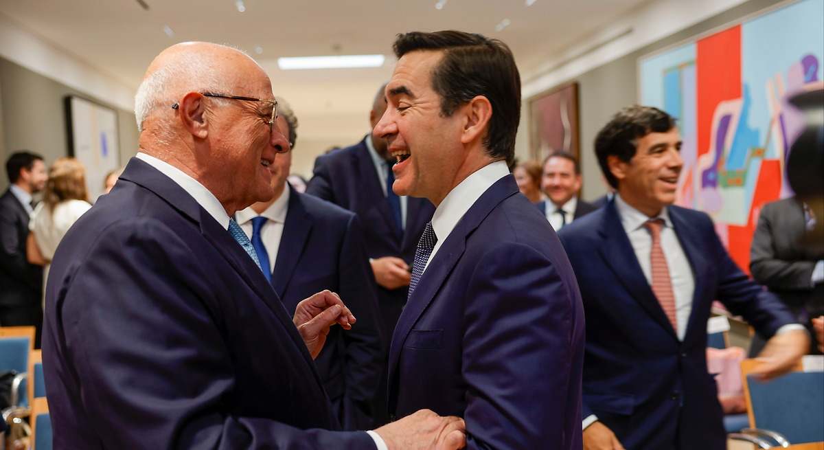 El presidente de Sabadell, Josep Oliu, y el presidente de BBVA, Carlos Torres.