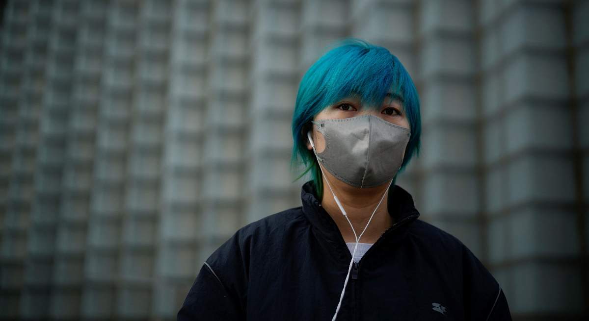 mujer-mascarilla-mujer-china-shanghai-12diciembre2022-reuters-1200x655.jpg