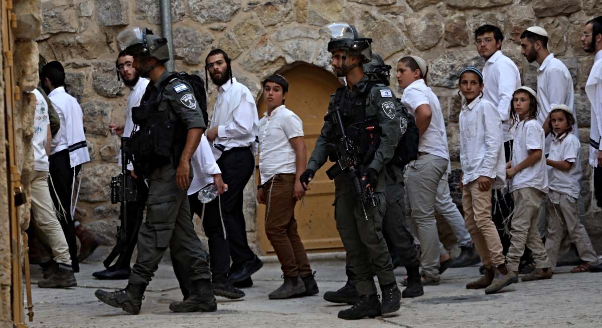 Colonos y militares israelíes /EP