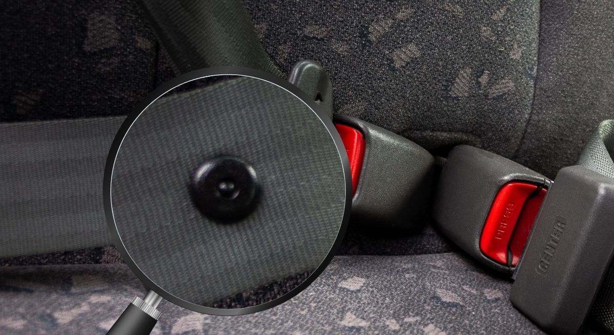 Cinturón de seguridad donde se destaca el botón