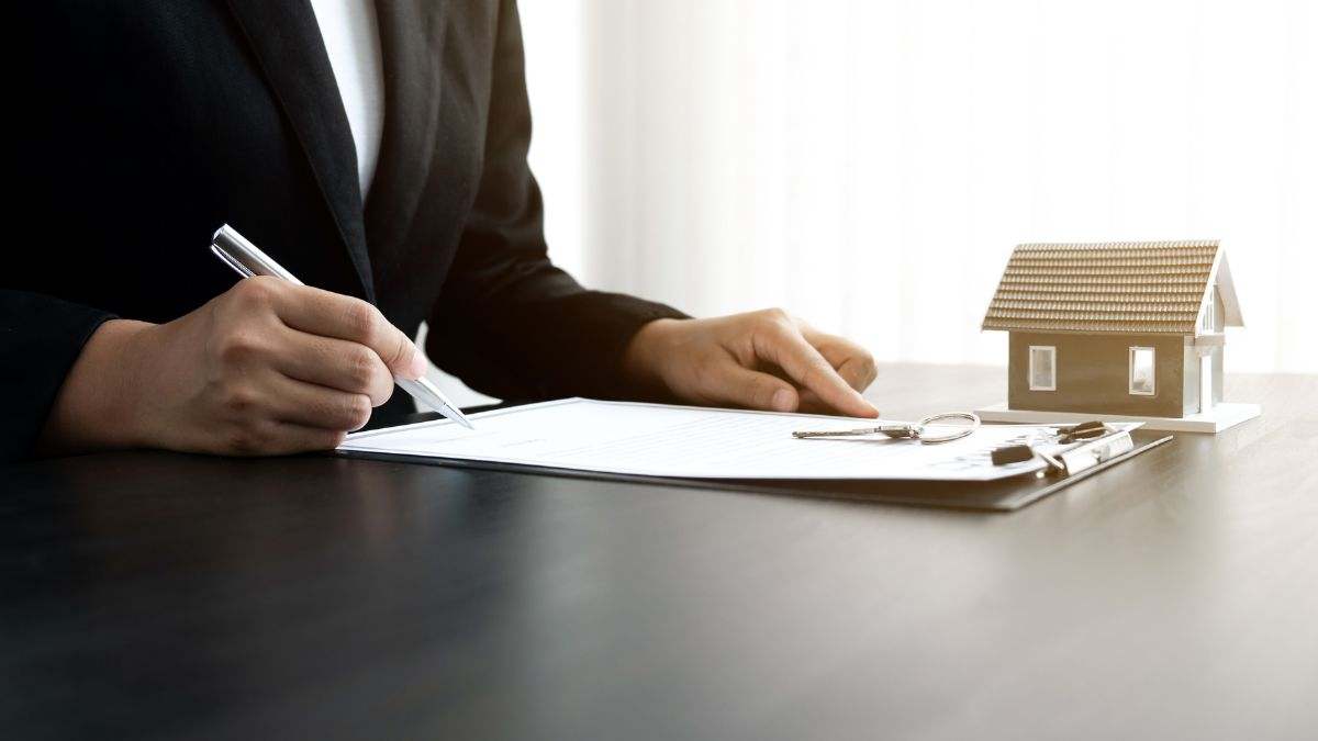 Foto de recurso de una firma de contrato de alquiler.