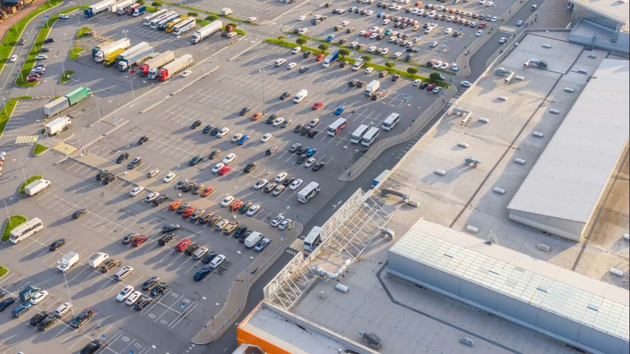 aparcamiento parking supermercado coches compra
