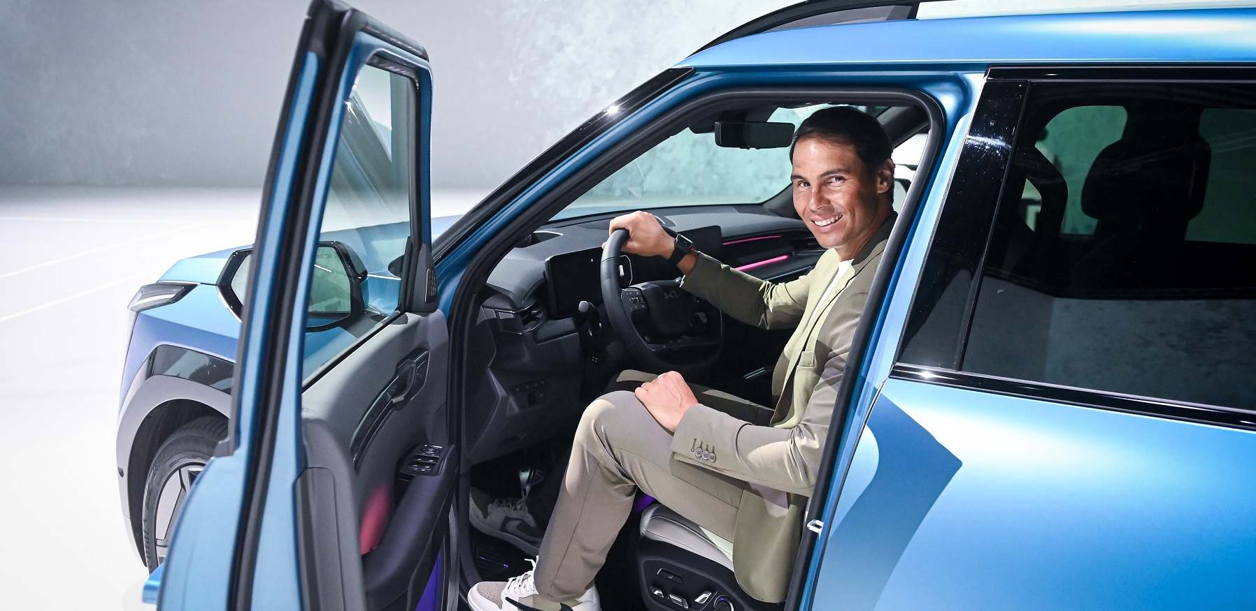 Image2KiapresentsRafaelNadalwithEV9GT-lineinOceanBlueMatte.jpg