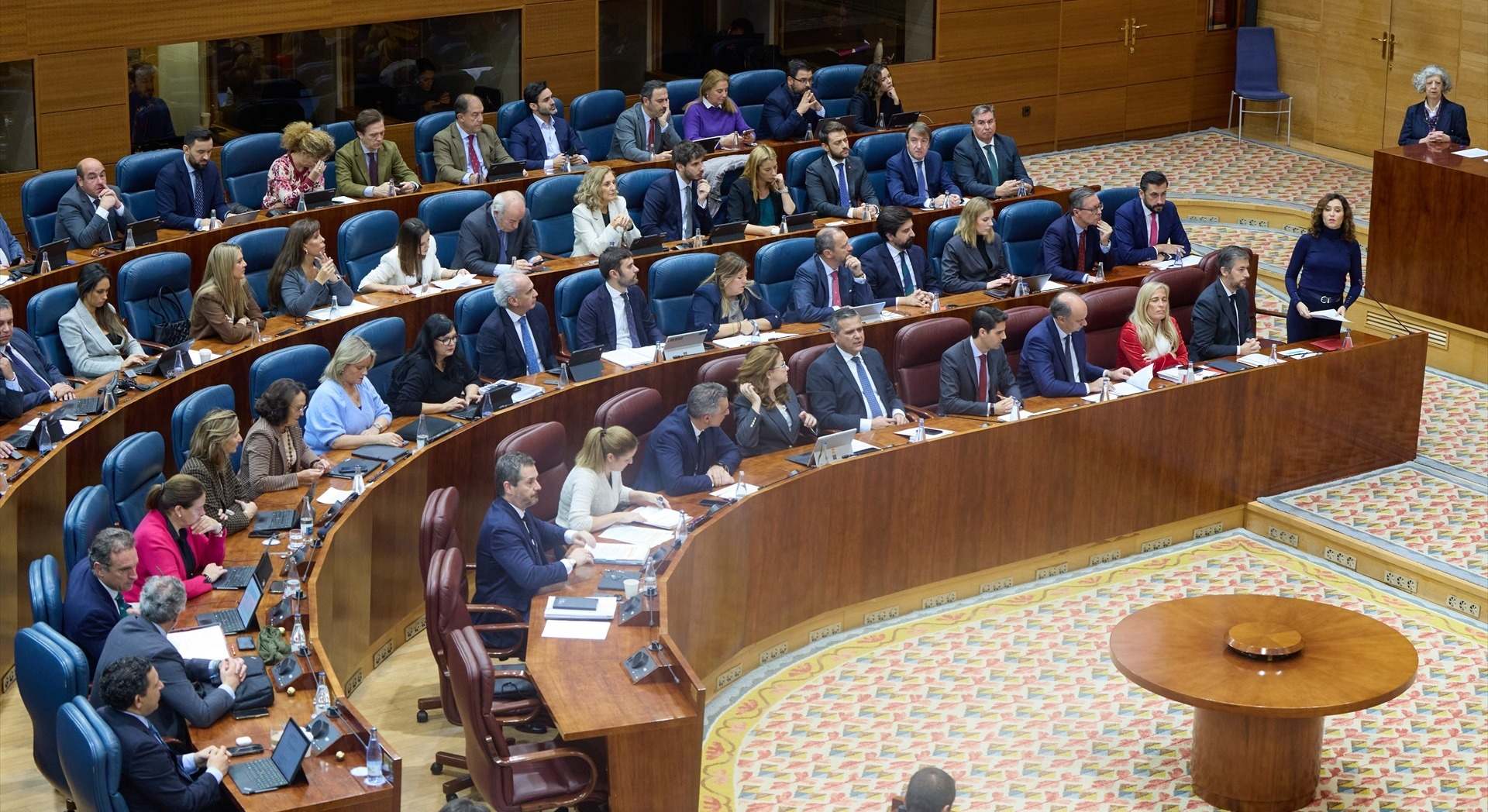 La bancada popular durante un pleno en la Asamblea de Madrid