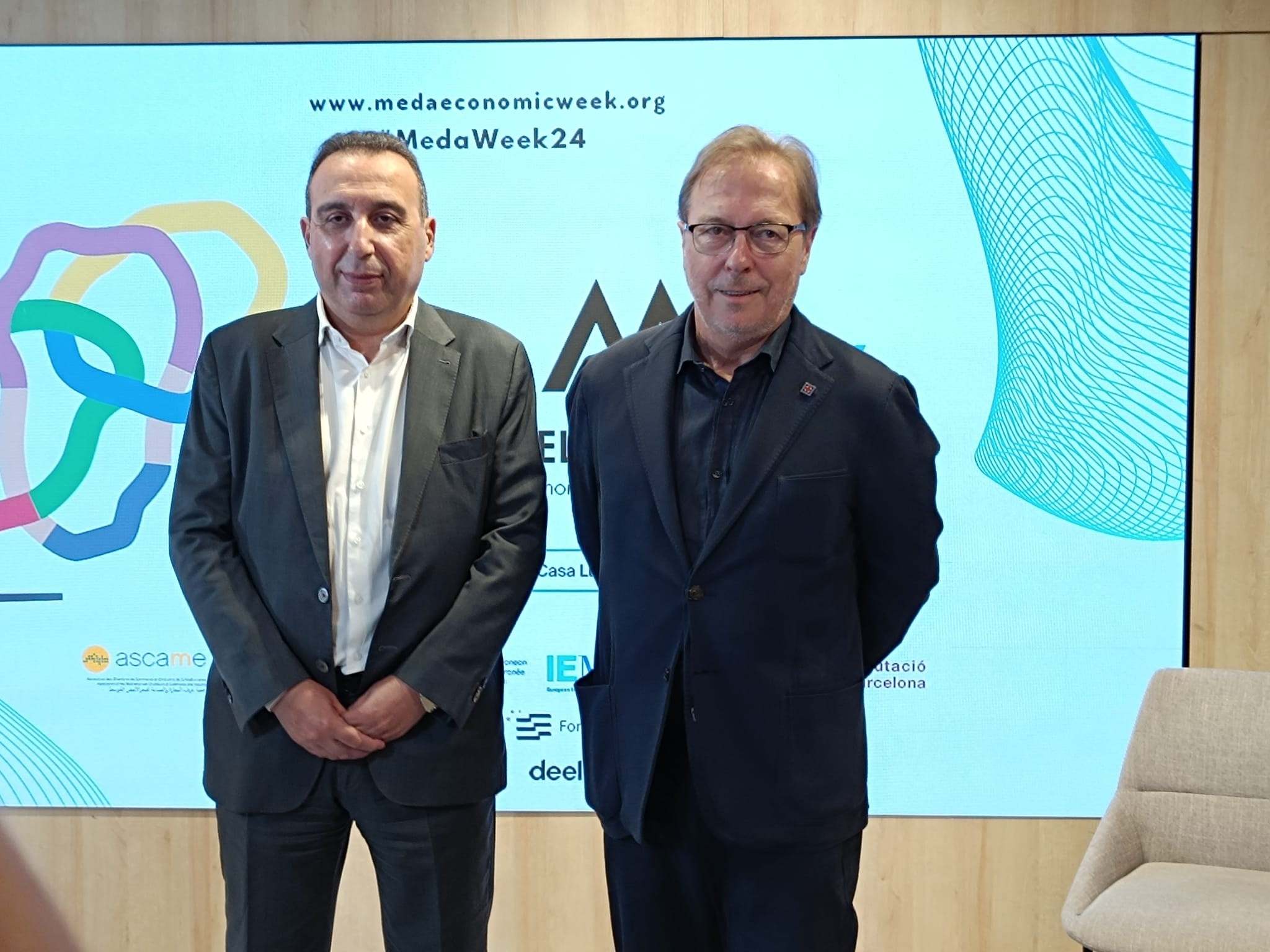 El coordinador general de Ascame, Anwar Zibaoui, y el presidente de la Cámara de Comercio de Barcelona, Josep Santacreu. EE