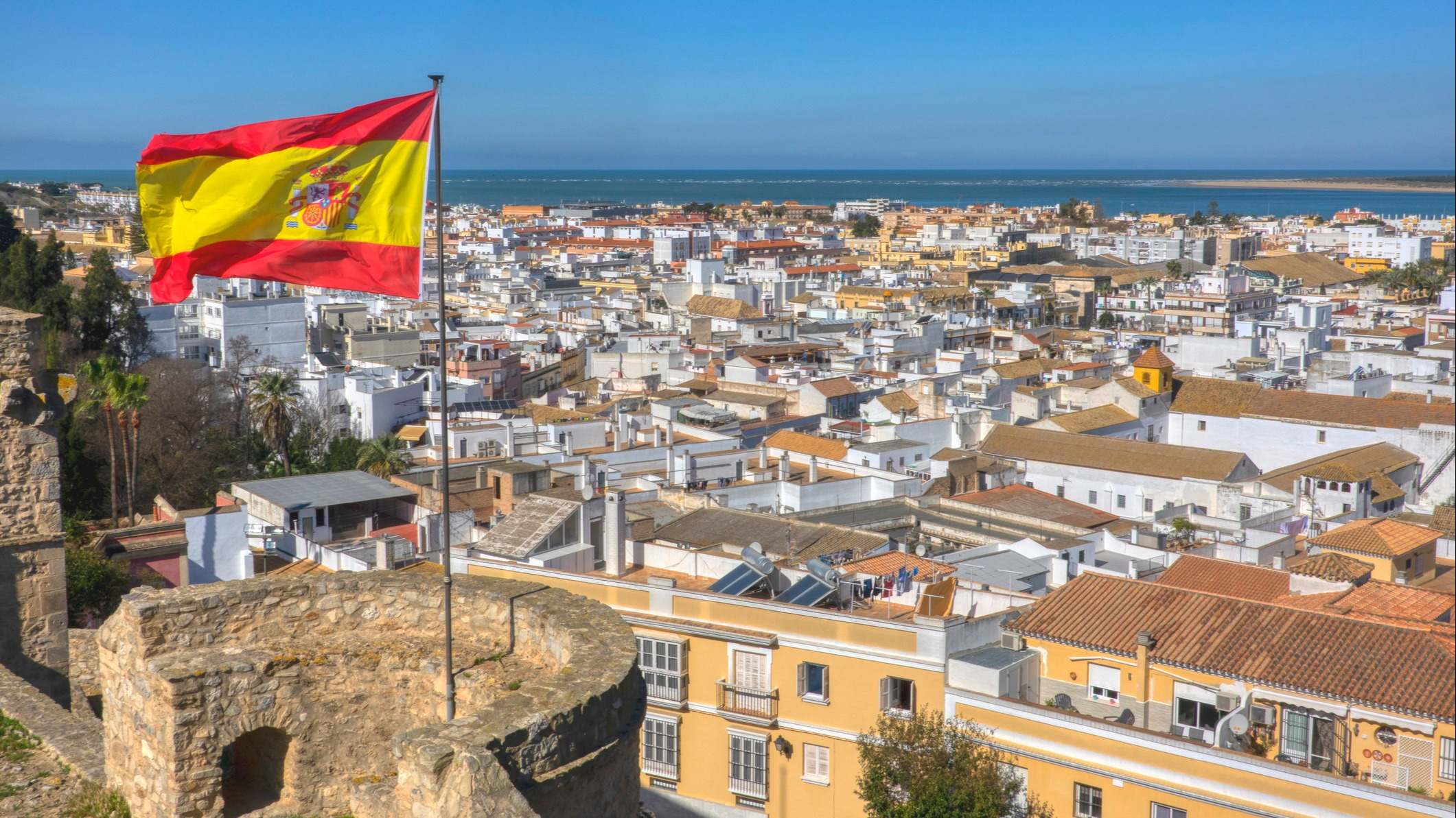 España bandera Sanlucar economía