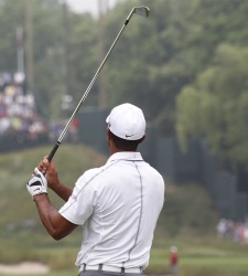 Woods-espaldas-drive-golf-2013-reuters.jpg