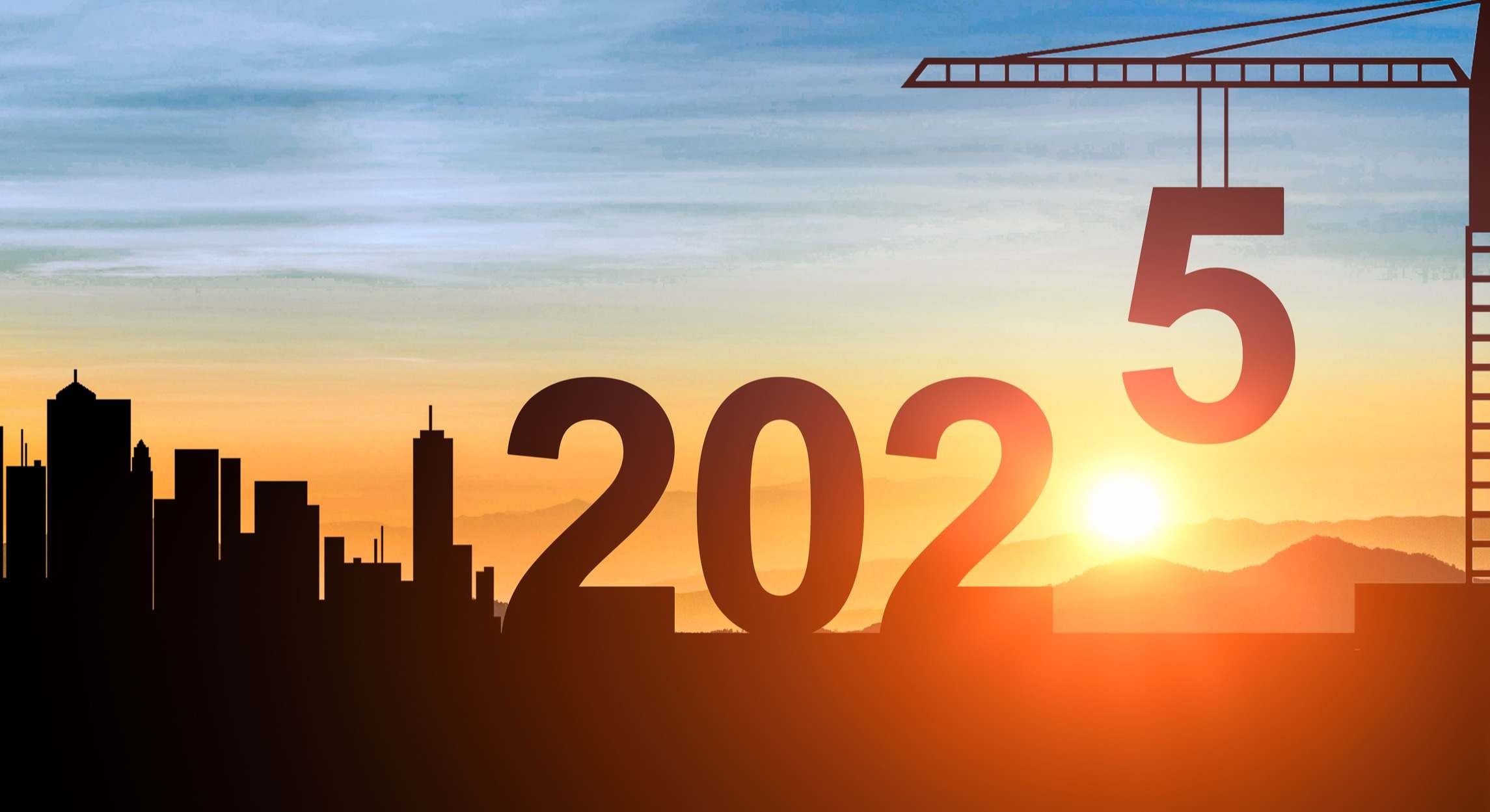 Una grúa pone el '5' para completar '2025'