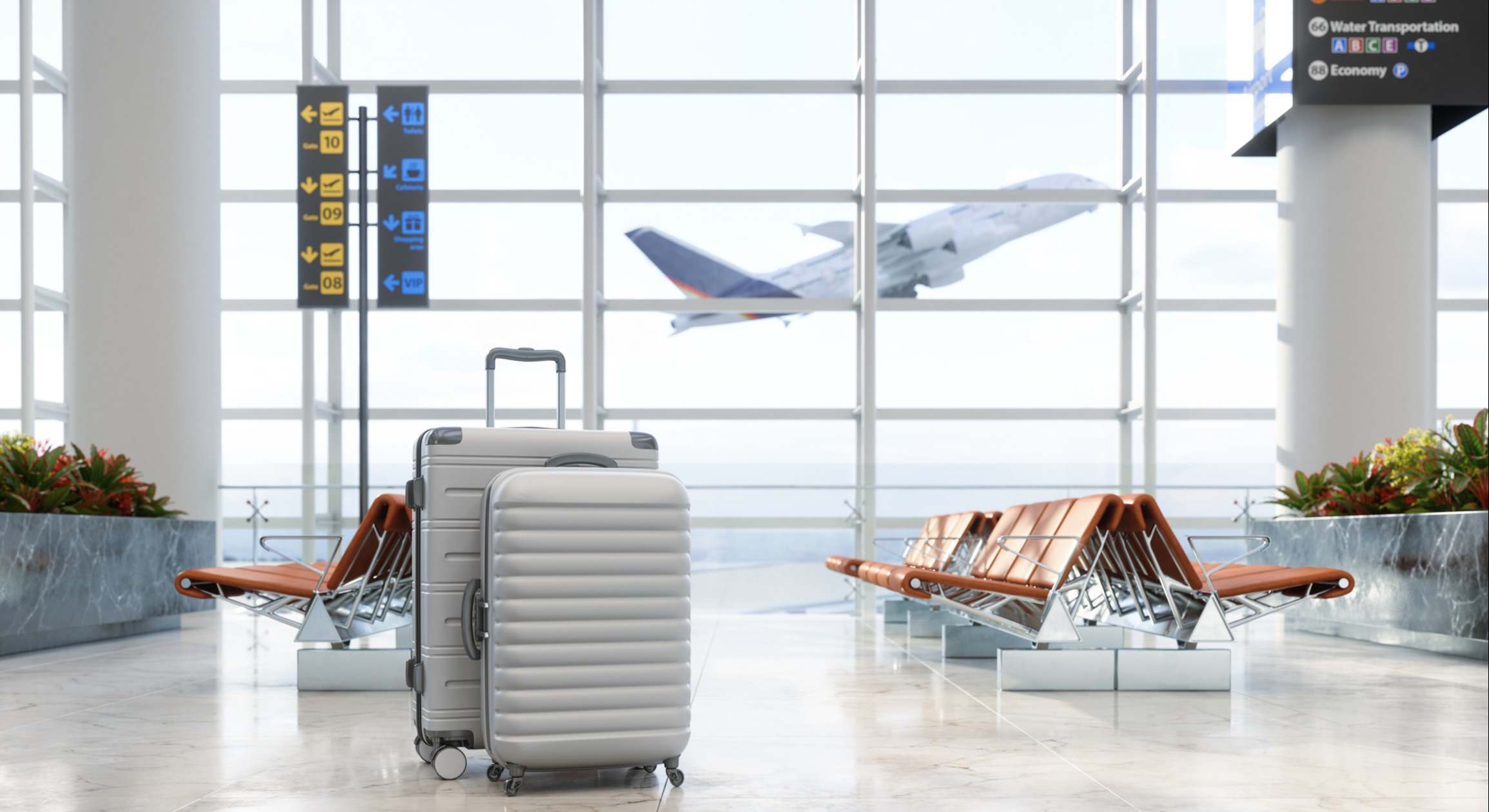 Área de espera del aeropuerto con equipaje, asientos vacíos y fondo borroso