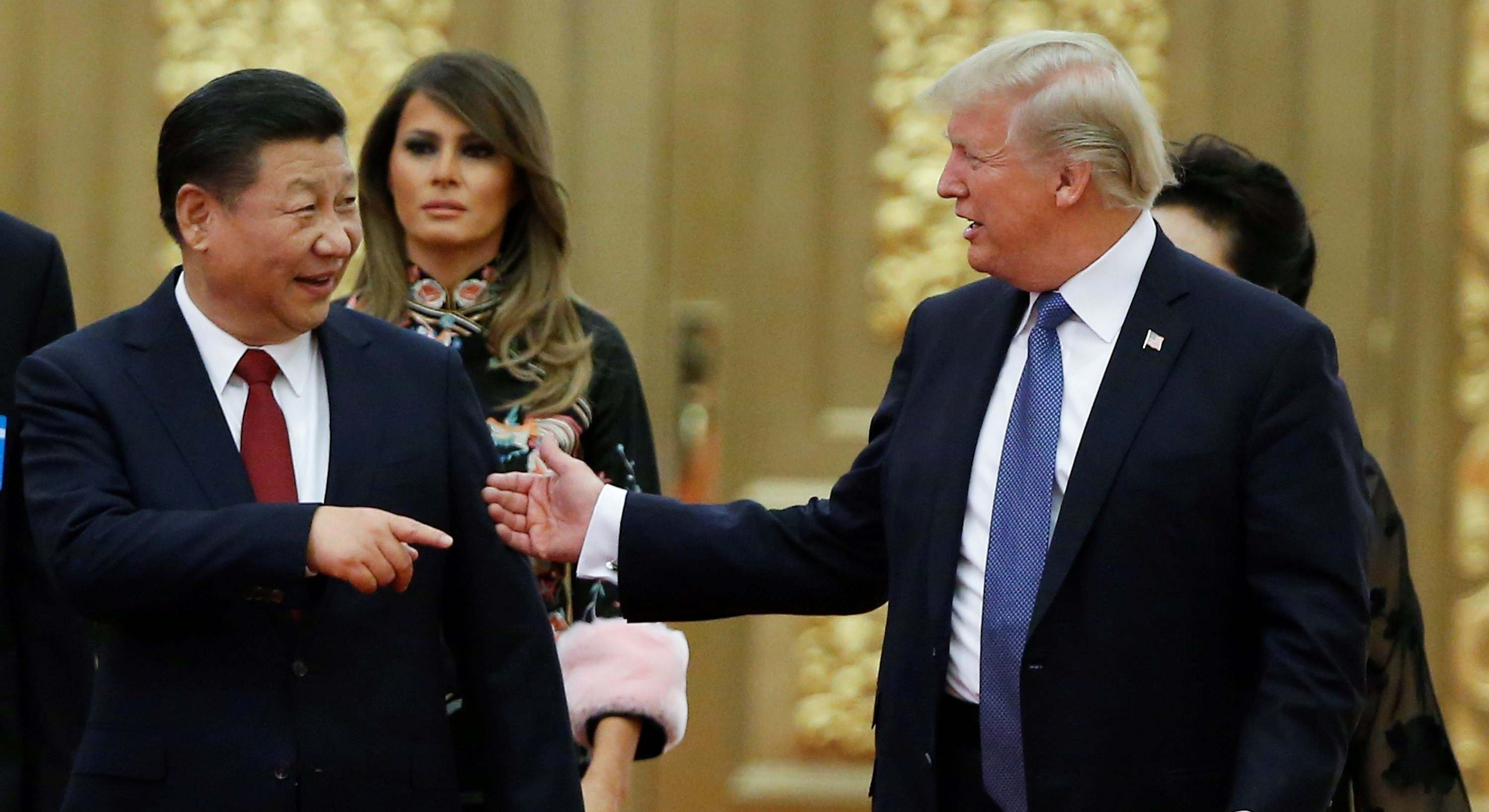 Xi Jinping y Donald Trump se dan la mano