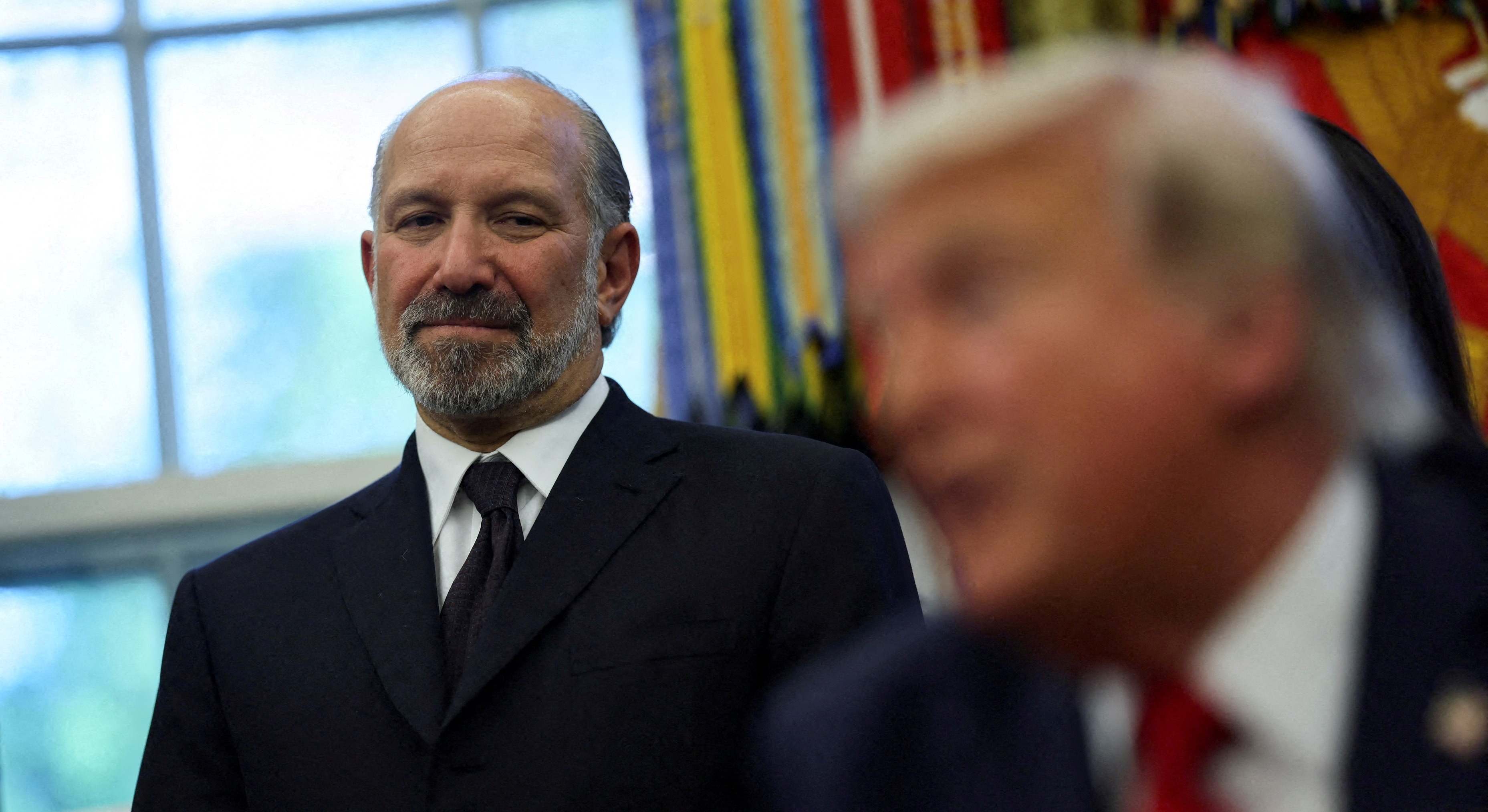 Howard Lutnick, secretario de Comercio de EEUU, junto a Donald Trump. Foto: Reuters