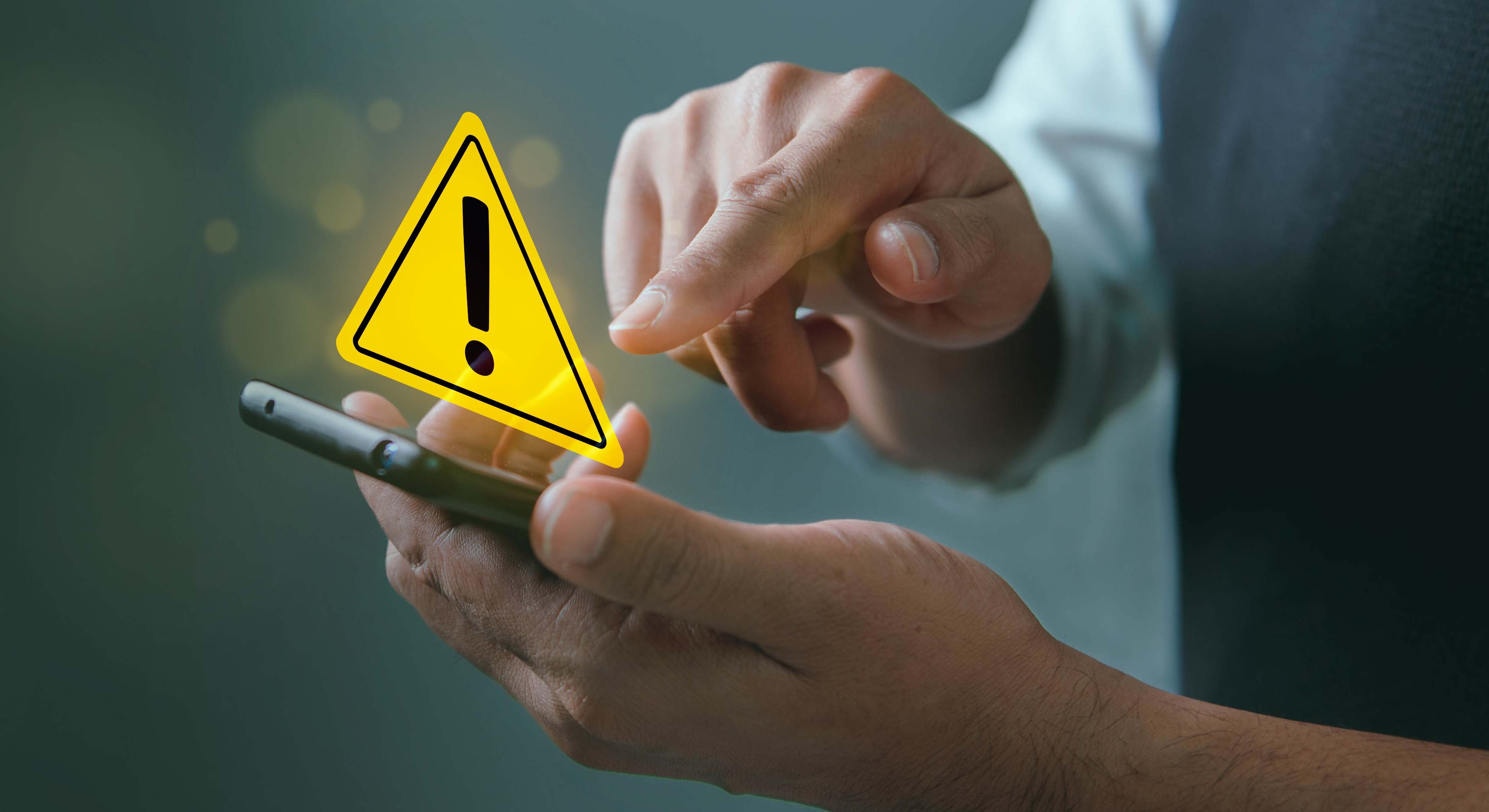 Símbolo de alerta sobre un móvil