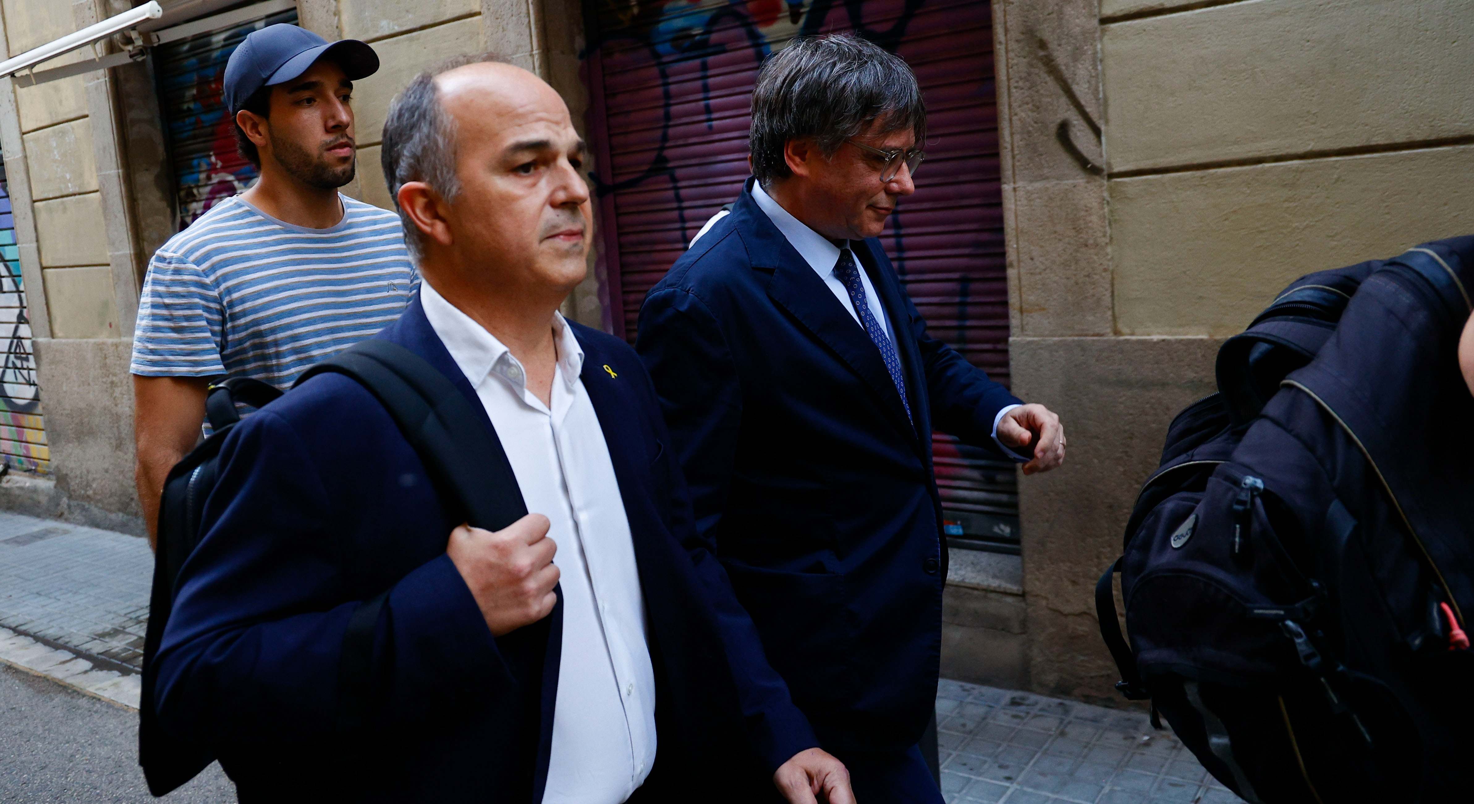 Jordi Turull junto a Carles Puigdemont este jueves en Barcelona
