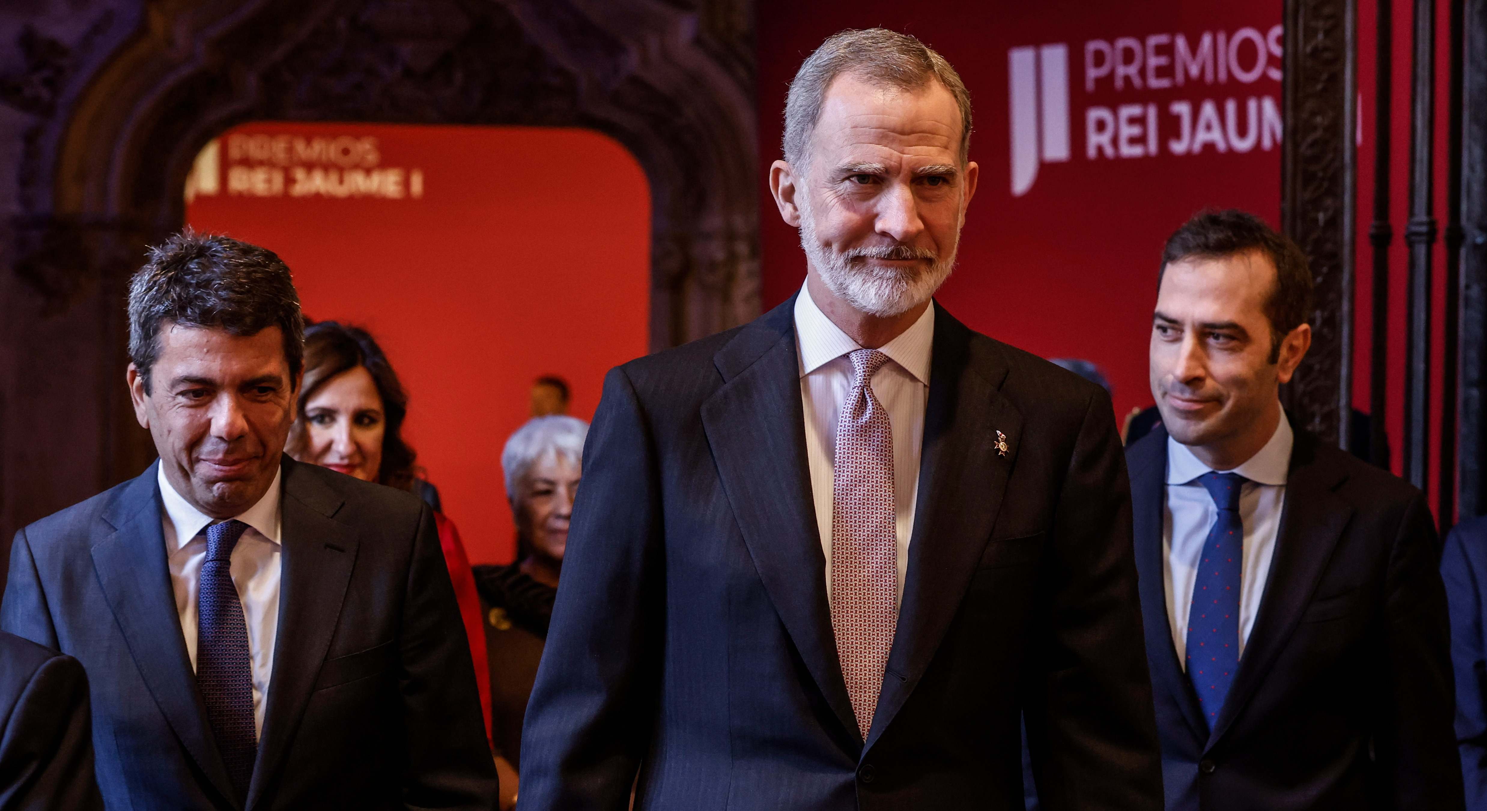 Felipe VI, con Carlos Mazón y el ministro Carlos Cuerpo en Valencia.