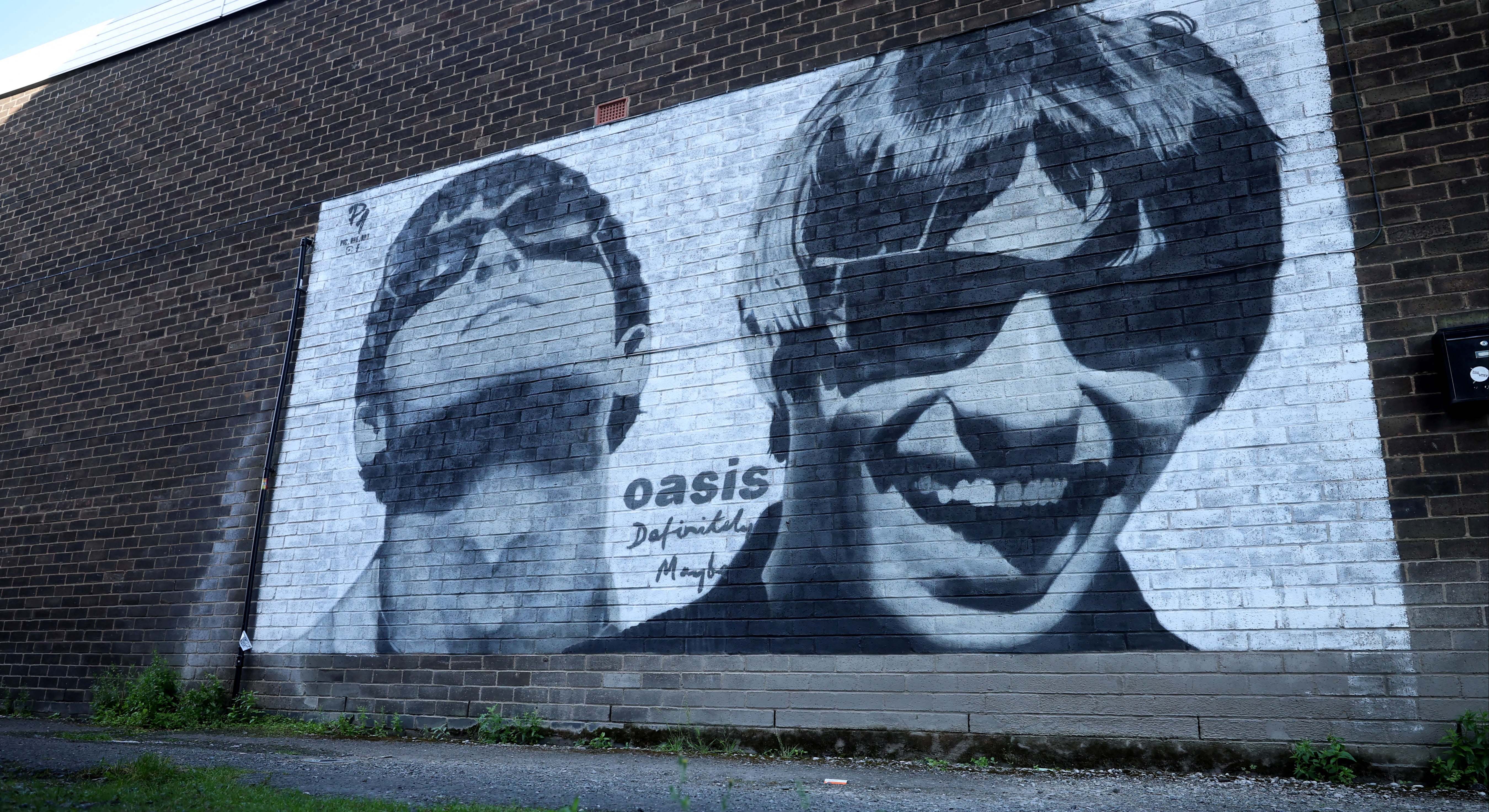 Mural de Oasis en una pared. Foto: Reuters
