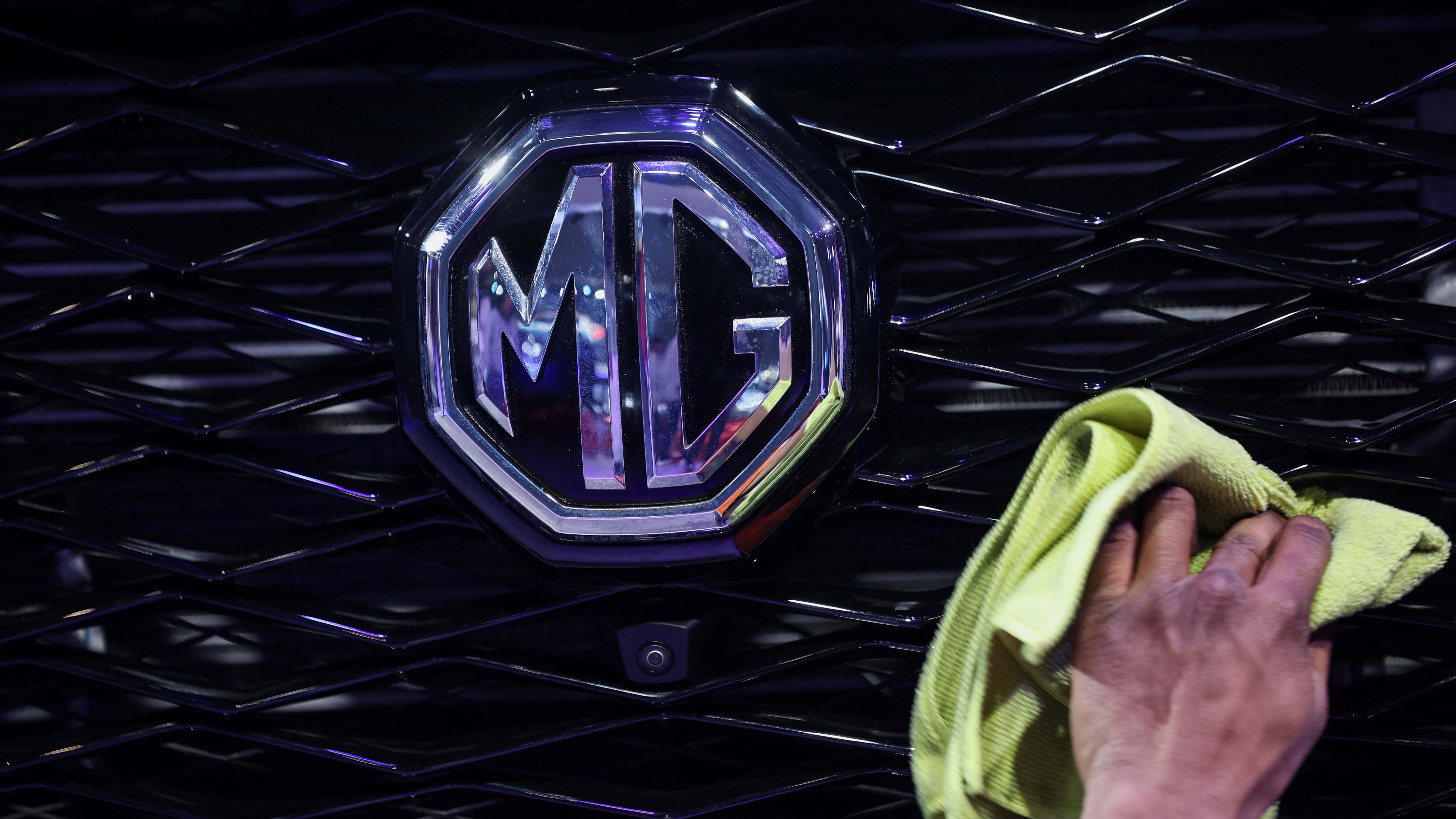 Logo de MG