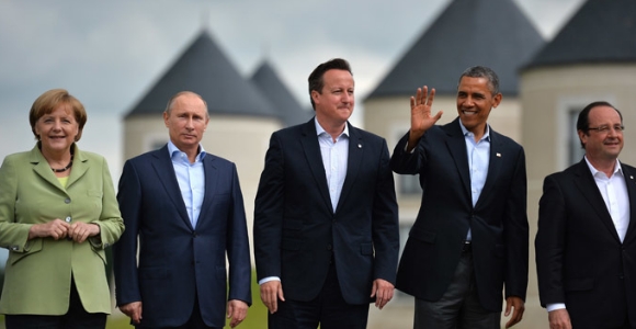 putin-merkel-hollande-reuters.jpg