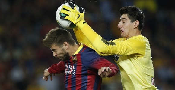 Courtois-parada-Pique-2013-reuters.jpg