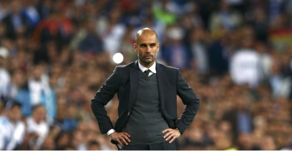 Guardiola-brazos-Bernabeu-2014-reuters.jpg