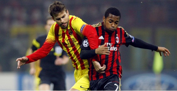 Pique-Robinho-2013-Reuters.jpg