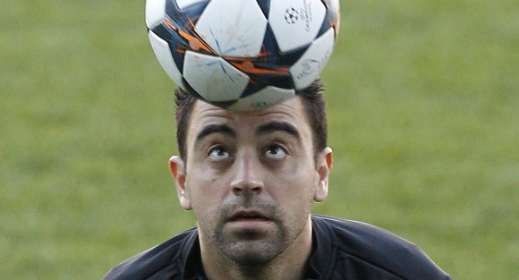 Xavi-mirada-pelota-2014-efe.jpg