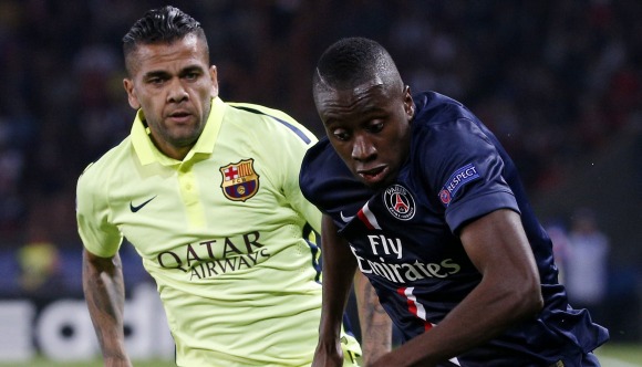 Alves-persigue-Matuidi-2014-efe.jpg