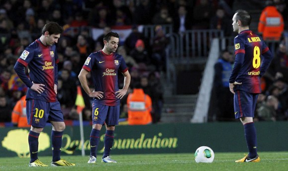 Messi-Xavi-Iniesta-hundidos-2013-efe.jpg