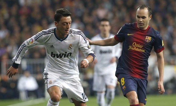 OZil-Iniesta-2013-reuters.jpg