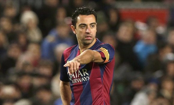 Xavi-capitan-senala-2015-efe.jpg