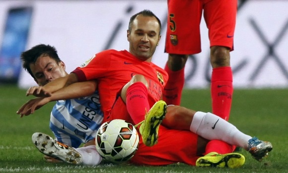 Iniesta-Malaga-suelo-2014-reuters.jpg