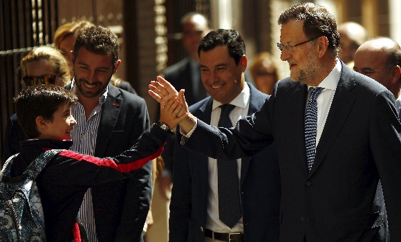 rajoy-nino-reuters.jpg