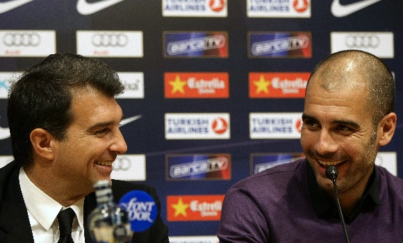 guardiola-laporta-reuters.jpg