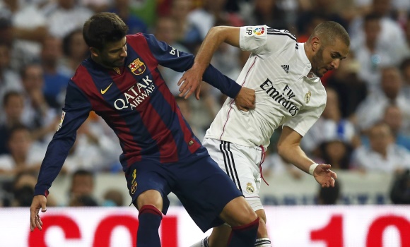 Pique-Benzema-2014-reuters.jpg