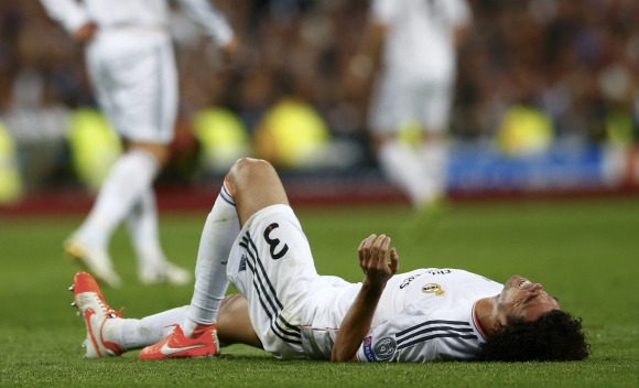 Pepe-tumbado-cesped-2014-Champions-reuters.jpg