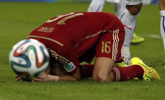 Busquets-lamento-espana-2014-reuters.jpg