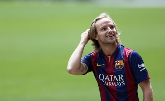 Rakitic-presentacion-gesto-2014-reuters.jpg