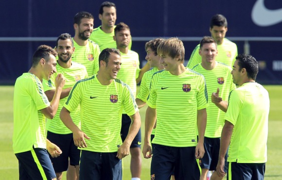 Samper-Xavi-entreno-2014-efe.jpg