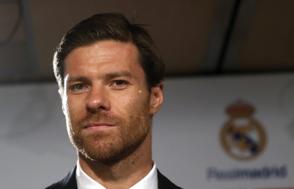 Xabi-Alonso-RP-escudo-RM-2014-reuters.jpg
