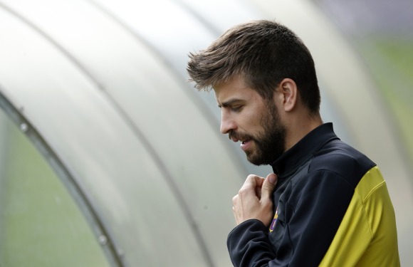 Pique-entrenamiento-2014-reuters.jpg