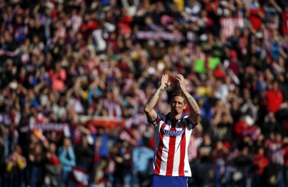 Torres-saluda-publico-reuters-2015.jpg