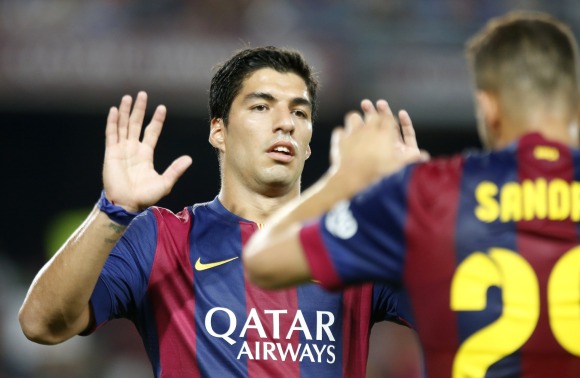Luis-Suarez-gol-Sandro-2014-reuters.jpg