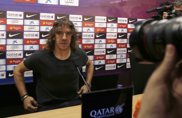 Puyol-rp-sienta-2014-efe.jpg