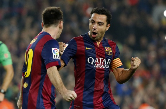 Xavi-celebra-Messi-2015-Reuters.jpg