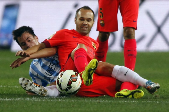 Iniesta-Malaga-suelo-2014-reuters.jpg