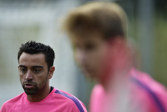 Xavi-entreno-difuminado-2014-reuters.jpg