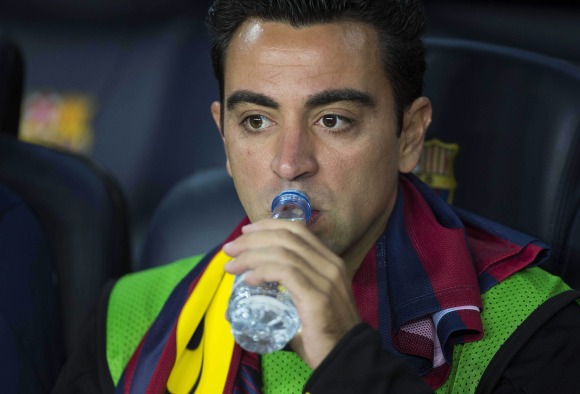Xavi-bebe-agua-2013-efe.jpg
