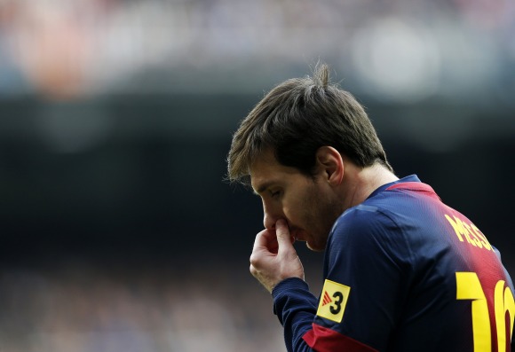 Messi-serio-bernabeu-2013-reuters.jpg