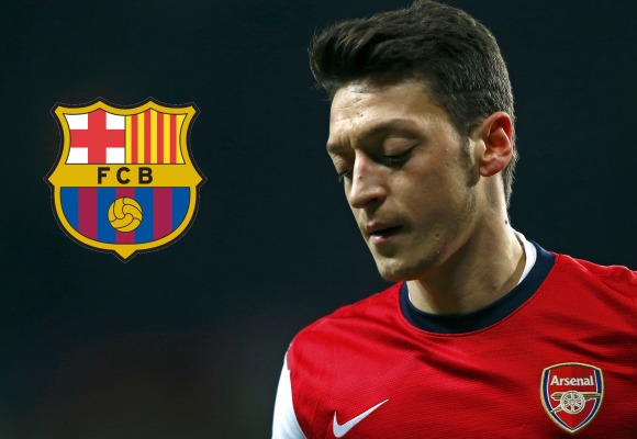 Ozil-escudo-barcelona-2014-reuters.jpg